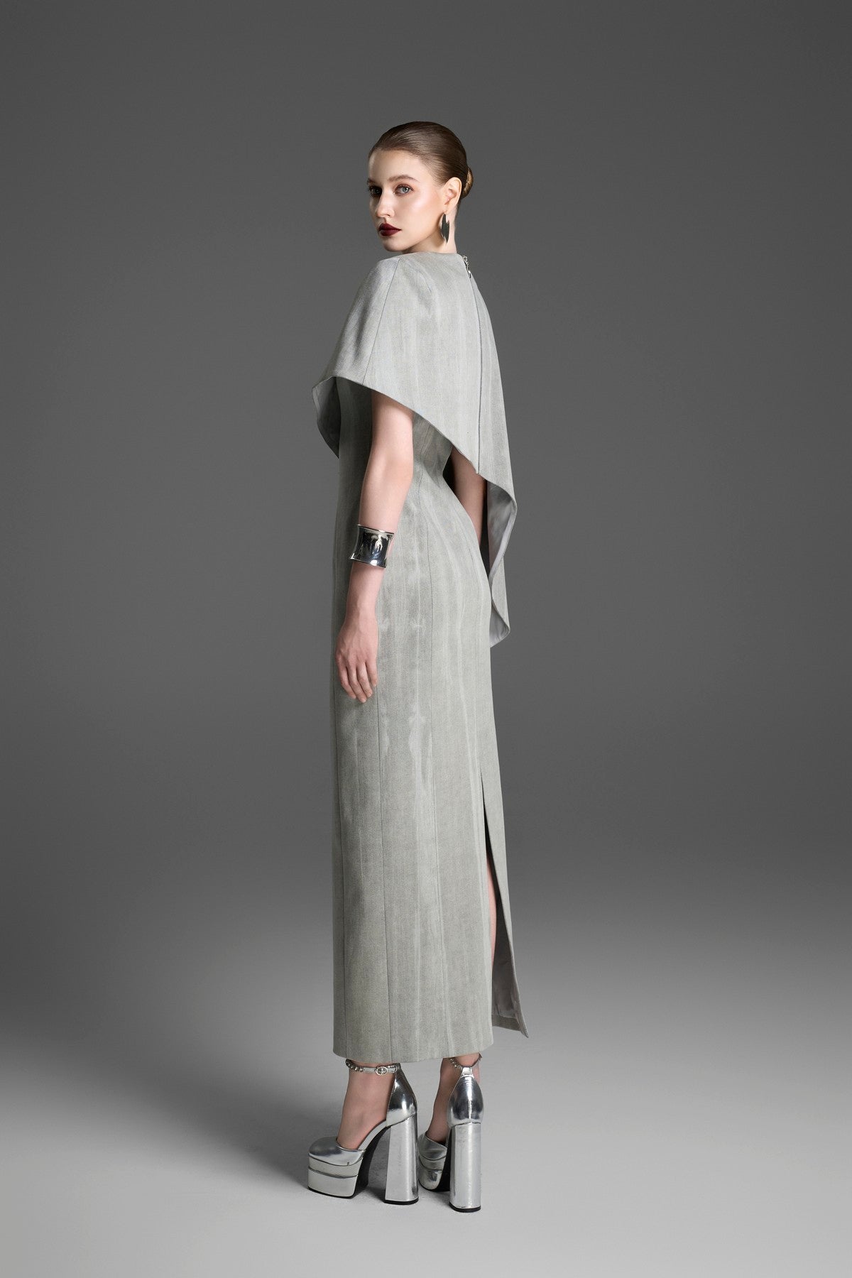 Asymmetrical Column Dress with a Single Draped Cape Sleeve