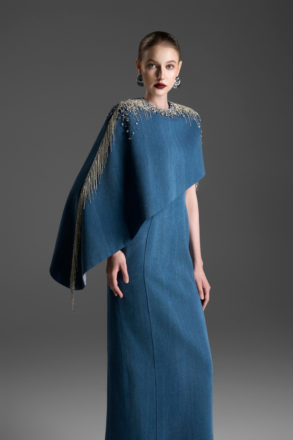 Asymmetrical Column Dress with a Single Draped Cape Sleeve
