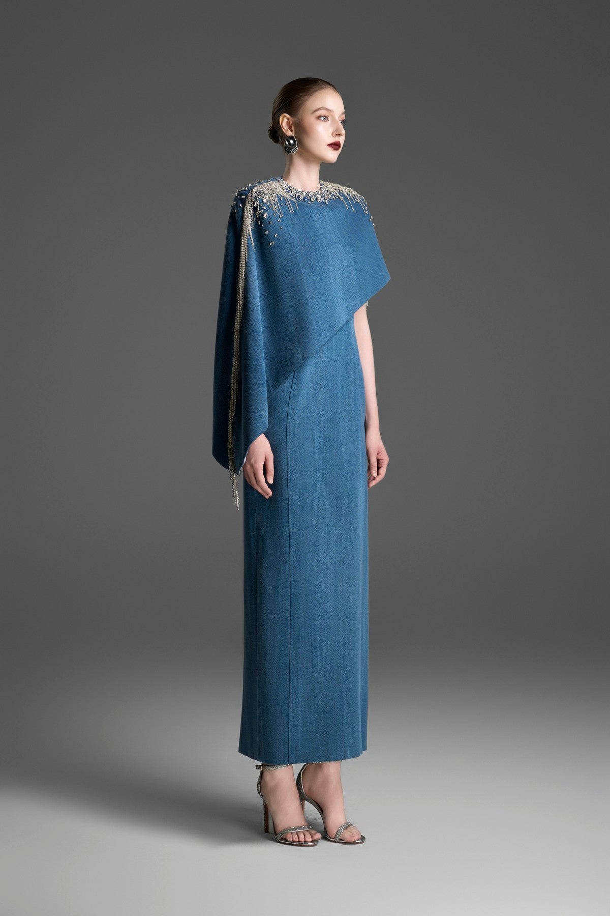Asymmetrical Column Dress with a Single Draped Cape Sleeve