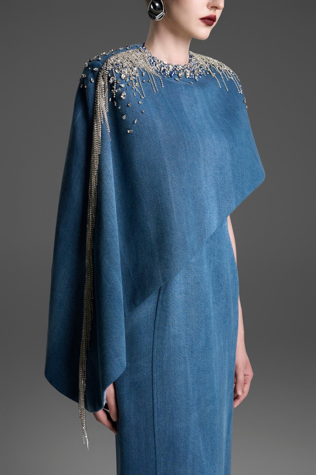 Asymmetrical Column Dress with a Single Draped Cape Sleeve