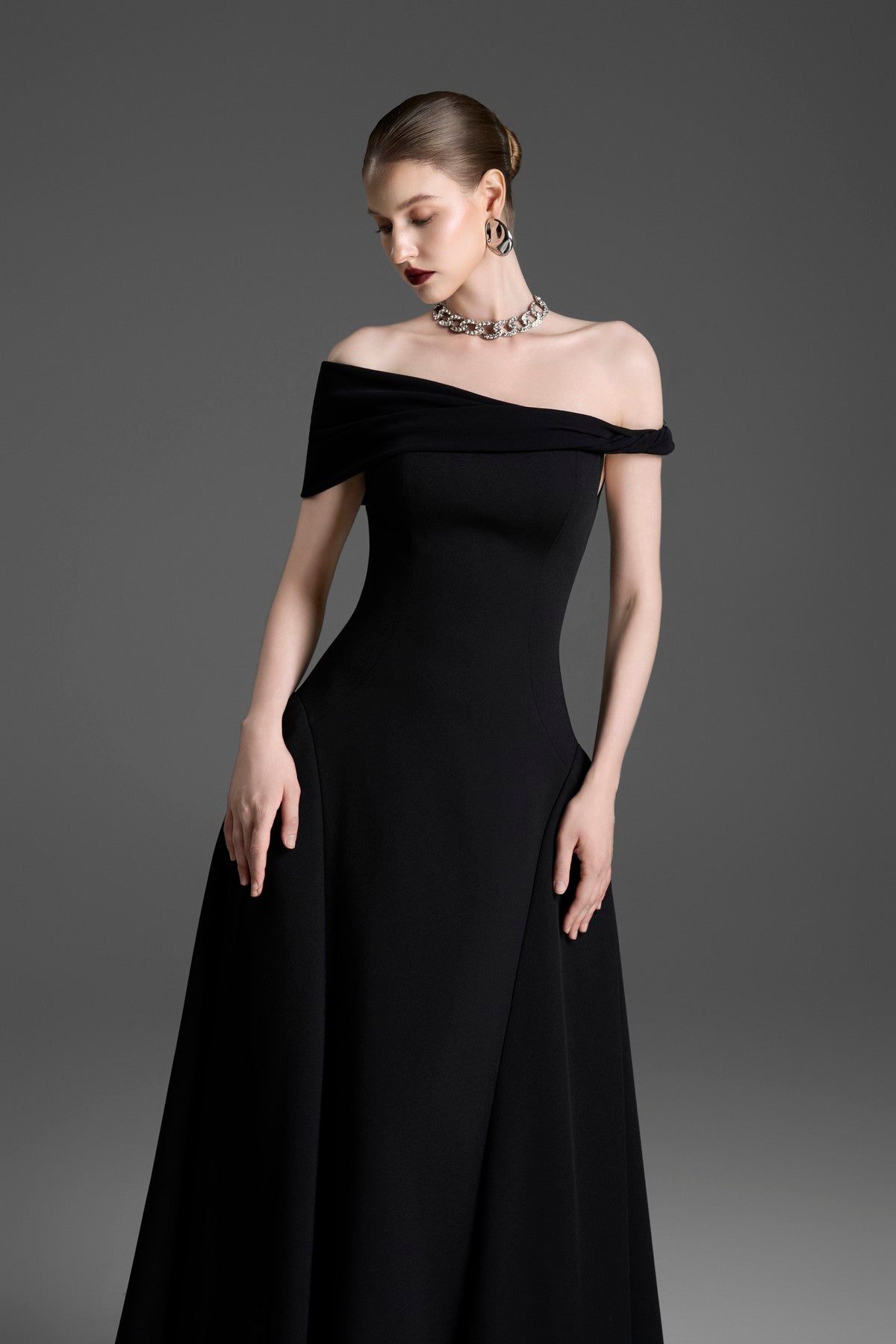 Asymmetrical Evening Gown with a Twisted Shoulder and Pleated Waist
