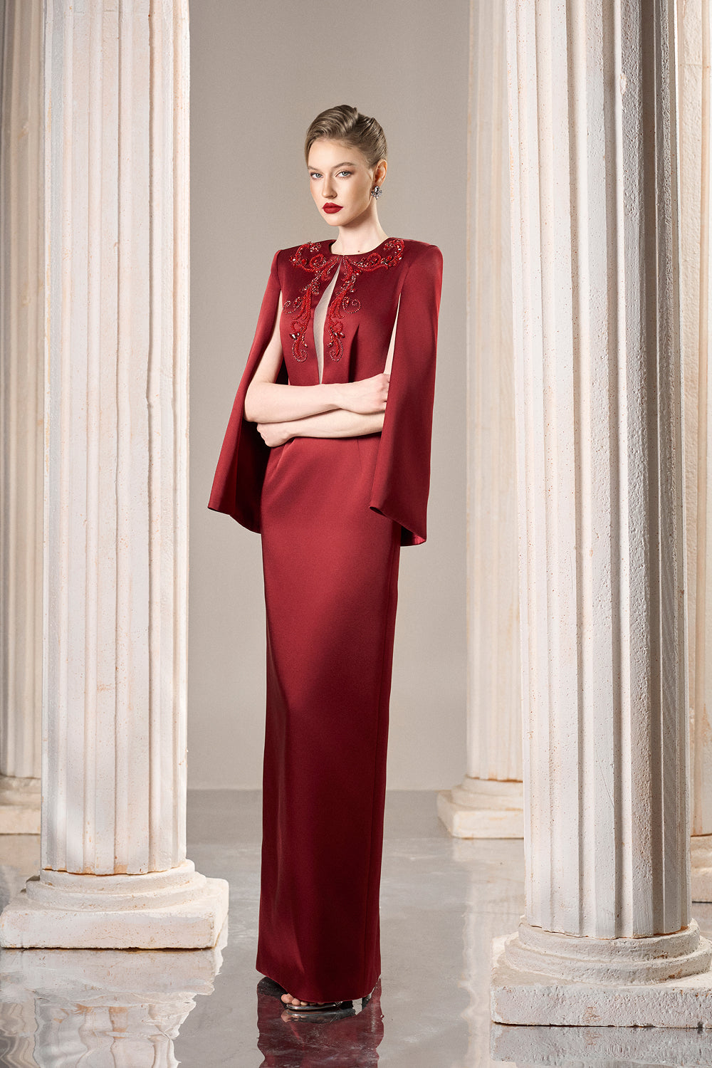 Dress Structured taffeta gown, crystal bodice, dramatic slit sleeves
