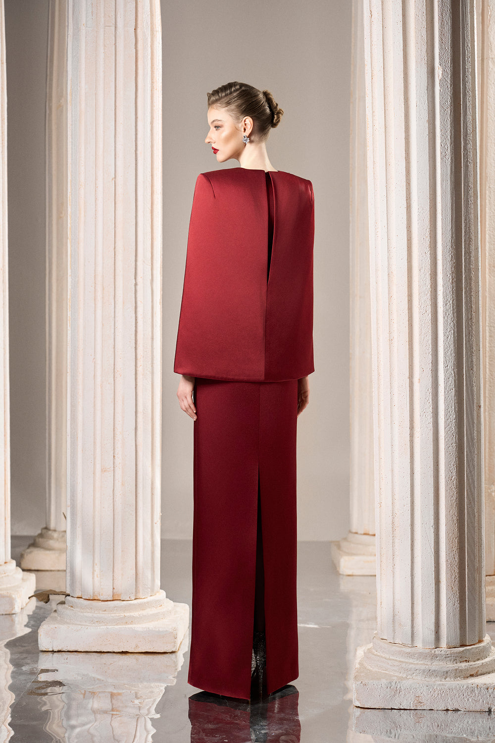 Dress Structured taffeta gown, crystal bodice, dramatic slit sleeves