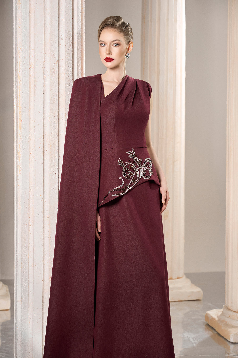 Dress Asymmetrical column dress with a single draped cape sleeve