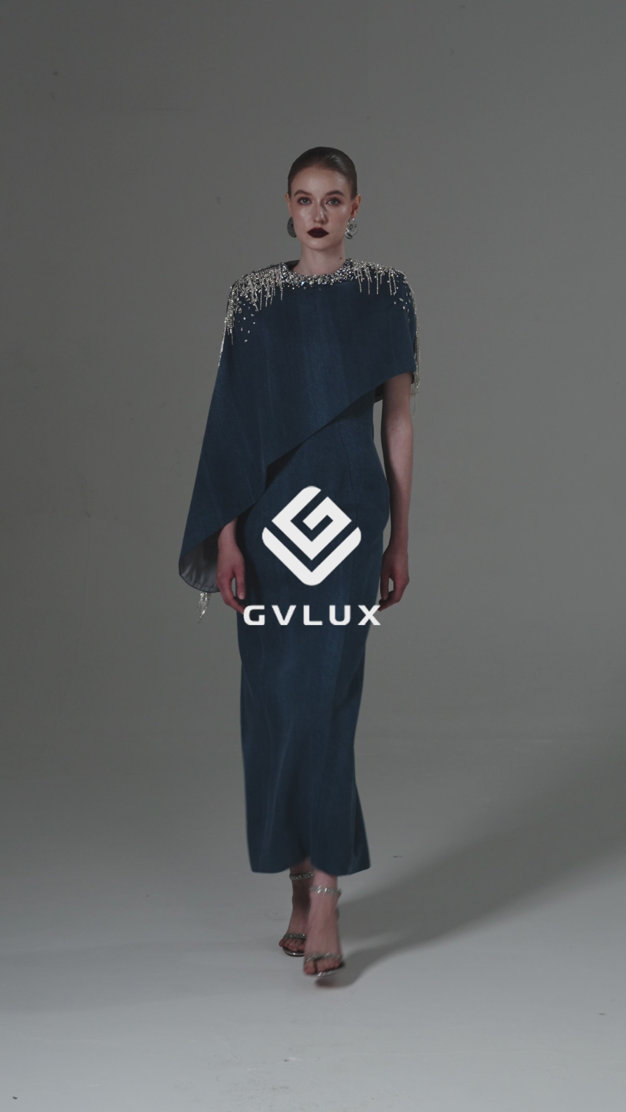 Asymmetrical Column Dress with a Single Draped Cape Sleeve with Crystal embellishment