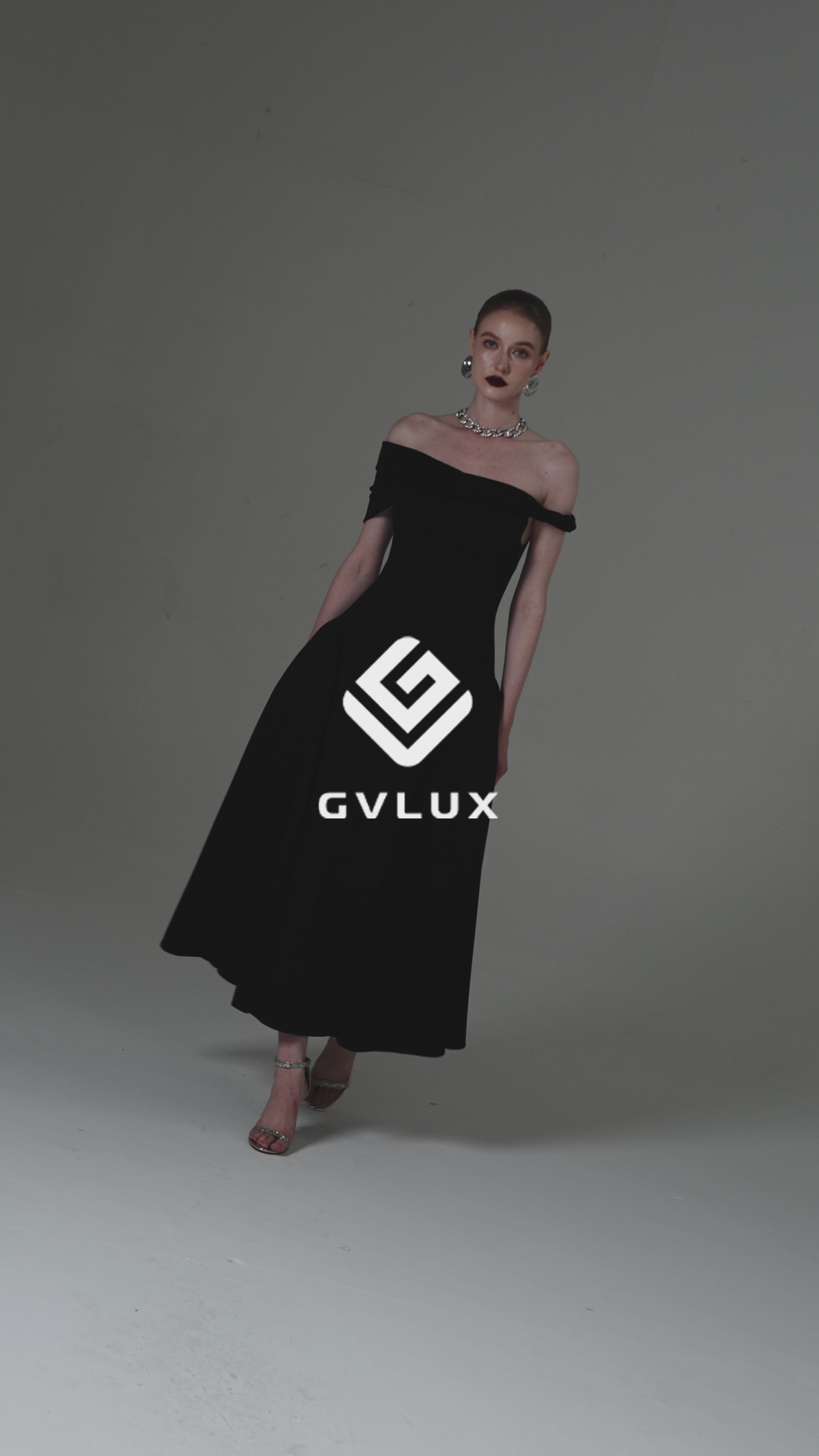 Asymmetrical Evening Gown with a Twisted Shoulder and Pleated Waist