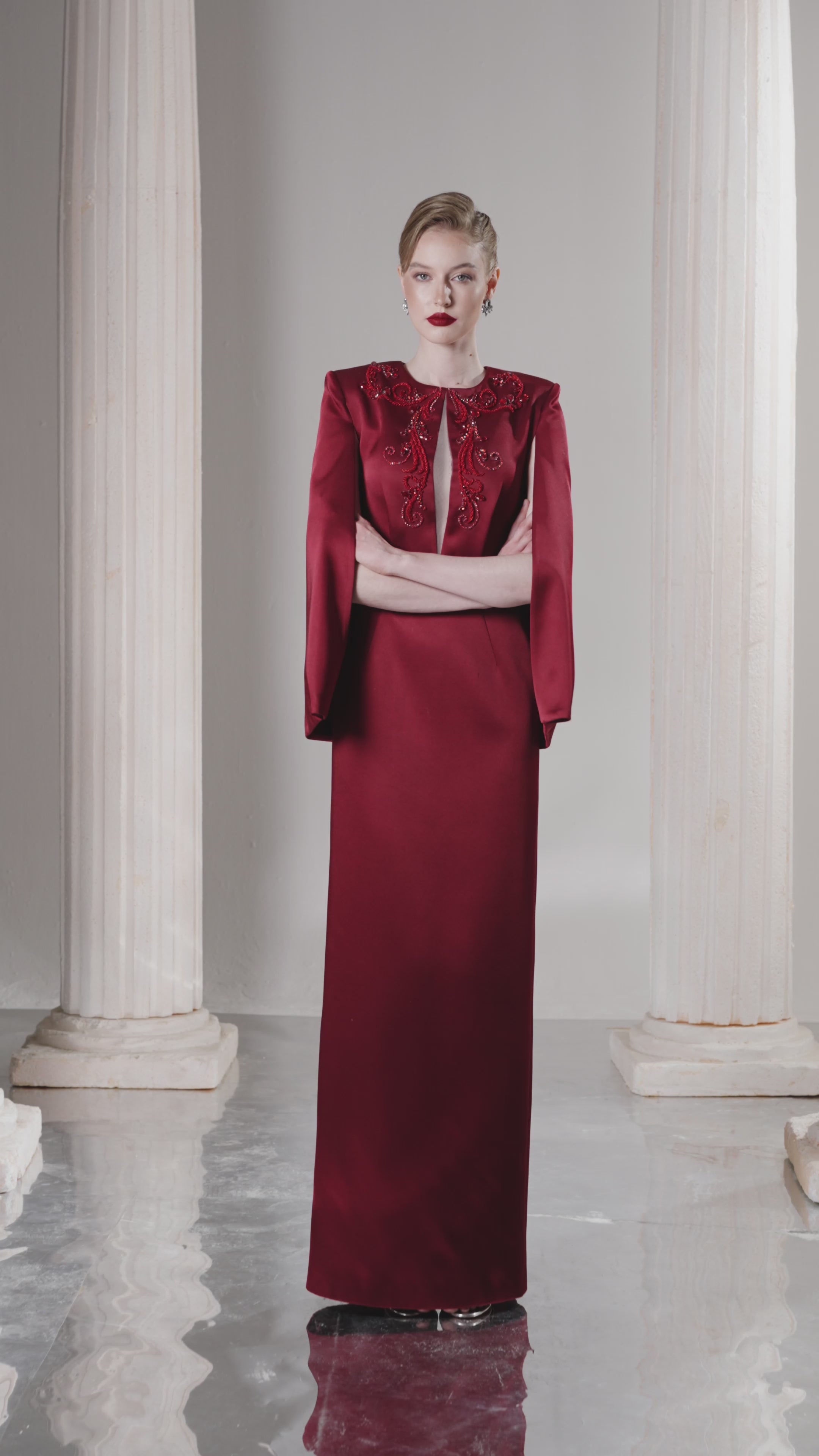 Dress Structured taffeta gown, crystal bodice, dramatic slit sleeves